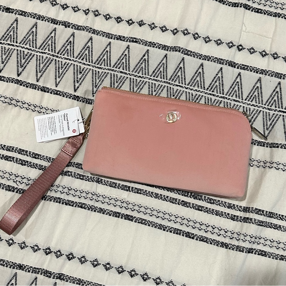 NWT lululemon Curved Wristlet Color: Pink